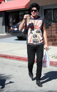 Adam Lambert was spotted on April 7th 2010 at a convenience store in West Hollywood while sipping on a cold coffee beverage 1