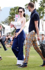 Dita Von Teese and a male friend seen during day 2 of the Coachella Valley Music and Art Festival 2010 held at The Empire Polo Club on April 17th 2010 in Indio California 2