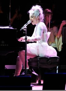 Lady Gaga on stage on May 13th 2010 at the Rain Forest Fund event while playing the piano 2