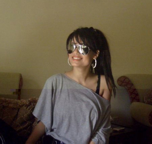 Rahma Ahmed posing for a picture with sunglasses