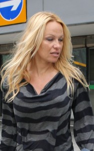 Pamela Anderson seen on June 18th 2010 as she exists from Heathrow Airport in London 4