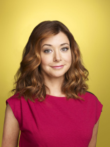 Alyson Hannigan photoshoot for  HOW I MET YOUR MOTHER TV comedy show wearing a pink berry dress