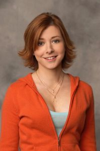 Alyson Hannigan photoshoot for  HOW I MET YOUR MOTHER TV comedy show wearing an orange sweater