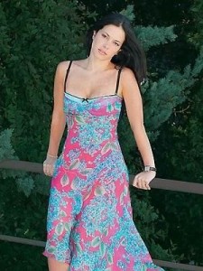 Coraima Torres photo wearing a blue and pink maxi dress