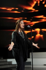 the thirteen prime of staracademy8 on June 24th 2011 picture of Nesma Mahgoub singing on stage