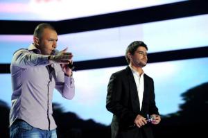 the thirteen prime of staracademy8 on June 24th 2011 picture of Nassif Zeitoun with Mohammad Daqdooq singing on stage