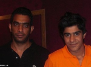 photo of the Kuwaiti student of star academy Abdul Salam after leaving star academy at the studio wearing an orange tshirt 2