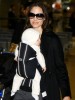 Angelina Jolie holding her son Vivienne Marcheline who is still six months old at Narita International Airport on January 27th in Narita  Chiba  Japan