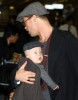 Brad Pitt holding his baby Knox Leon who is still six months old at Narita International Airport on January 27th in Narita  Chiba  Japan