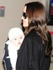 Angelina Jolie holding six-moths old Vivienne Marcheline as she arrives with her family at the Narita International Airport