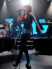 Lily Allen singing live on stage