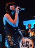 Lily Allen singing live on stage