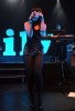 Lily Allen singing live on stage