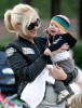 Gwen Stefani playing with baby Zuma Rossdale