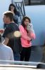 Miley Cyrus with a puppy on the film set in the Valley on Friday January 30th, 2009