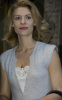 Claire Danes wearing two colorful gem necklace pendants