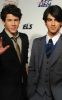 Joe Jonas and Nick Jonas arrive at the 2009 MusiCares Person of the Year Tribute in Los Angeles