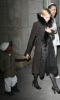 Madonna holding her son s hand David Banda as they leave the Kabbalah center