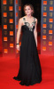 Emma Watson arrives at the BAFTA Awards