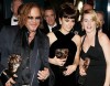 Kate Winslet with Penelope Cruz and Mickey Rourke at the BAFTA awards