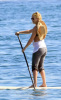 Kate Hudson paddle surfing with friends in Malibu on February 11th 2009