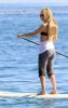 Kate Hudson paddle surfing with friends in Malibu on February 11th 2009