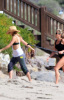 Kate Hudson paddle surfing with friends in Malibu on February 11th 2009