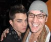 a picture of Adam Lambert short haircut together with his friend