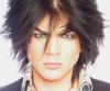 Adam Lambert face closeup picture huge hair style