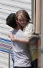 Hayden Panettiere and Milo Ventimiglia hugging on the filming set of the TV show Heroes