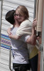 Hayden Panettiere and Milo Ventimiglia hugging on the filming set of the TV show Heroes