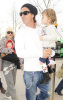 Gwen Stefani carrying Zuma along with husband Gavin Rossdale and their song Kingston