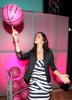 Eliza Dushku plays with a pink basketball at the Launch of the T Mobile myFaves Shot of a Lifetime Sweepstakes on February 13th 2009