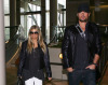 Fergie and Josh Duhamel were spotted jetting out of LAX Airport in Los Angeles on February 13th 2009 1