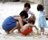 suri Cruise on the beach in Copa Cabana at Sushi place in Brazil on January 31st 2009 1