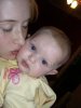 Alexis Grace kissing her cute little daughter who looks very much like her mommie