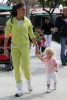 Katie Price aka Jordan holding the hand of baby Princess Tiaamii after having lunch at Tra di Noi in Los Angeles California on February 23rd 2009