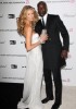 Elle Macpherson arrives with Oswald Boateng at the 17th Annual Elton John AIDS Foundation Academy Awards Viewing Party at the Pacific Design Center in West Hollywood California on the 22nd of February 2009