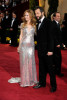 Director Judd Apatow and actress Leslie Mann arrive at the 81st Annual Academy Awards