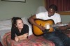 jojo and a friend who is playing guitar