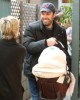 Ben Affleck carrying his baby daughter Seraphina Affleck while picking up Violet Affleck from school in Los Angeles California on March 6th 2009 4