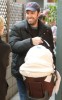 Ben Affleck carrying his baby daughter Seraphina Affleck while picking up Violet Affleck from school in Los Angeles California on March 6th 2009 1