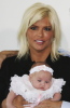 Dannielynn hope birkhead hugged by her mother anna nicole  smith