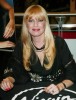 Traci Lords signs copies of her autobiography Traci Lords Underneath It All at Virgin Megastore Union Square on July 15th 2003 in New York City 6