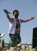 Gokhan Tepe new added photos on an outdoor stage during a concert