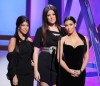 Kim Kardashian with Kourtney Kardashian and Khloe Kardashian on stage at the Bravos 2nd Annual A List Awards on April 5th 2009 3