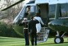 first lady Michelle Obama and President Barack Obama boarding Marine One as they depart the White House on March 31st 2009 in Washington DC