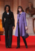 Michelle Obama with french First Lady Carla Bruni Sarkozy arrive at the restoration workshops of the Notre Dame Cathedral Palace on April 4th 2009 in Strasbourg France 1