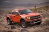 Ford f150 2010 ford f150 svt raptor 2010 orange Ford F 150 SVT Raptor front and right side view