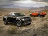 Ford f150 2010 ford f150 svt raptor Black and orange 2010 Ford F 150 SVT Raptor beside each other